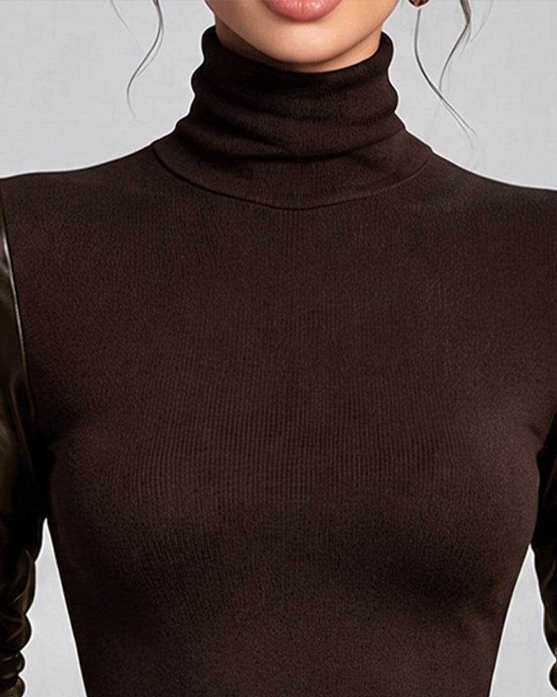 Women's fitted turtleneck top with long sleeves and contrasting glossy sleeve finish