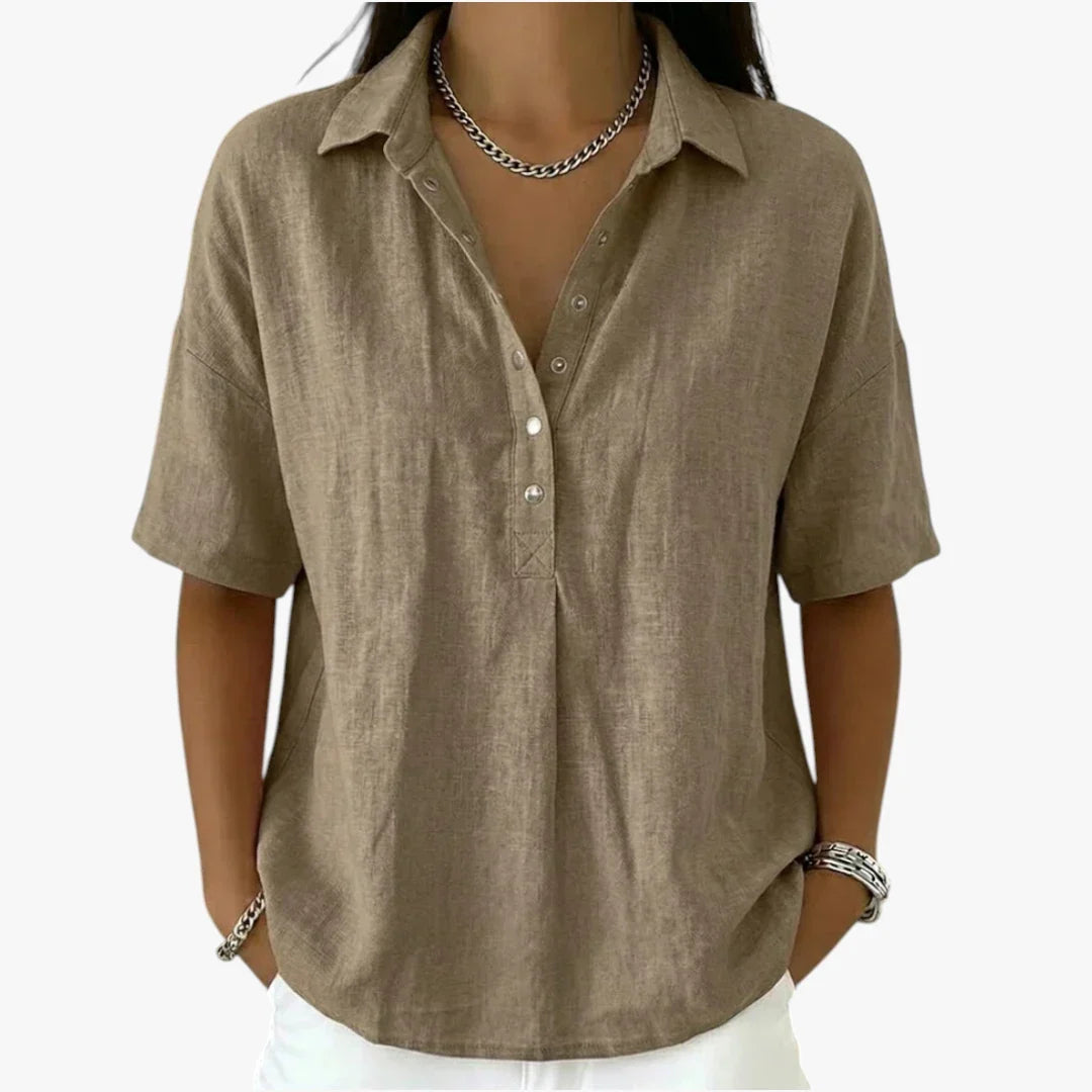 Women's oversized short sleeve blouse with pointed collar and partial button placket