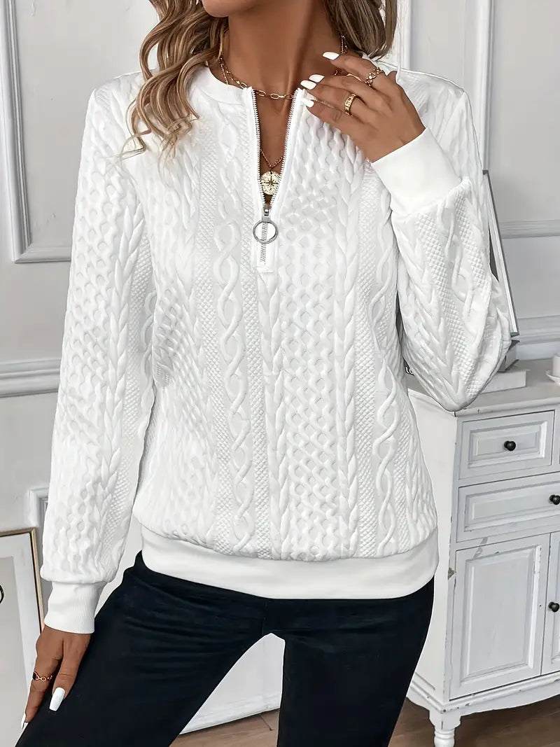 Women's textured cable knit half-zip sweater with long sleeves and ribbed trim