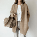 Women's longline cardigan with round neckline, long sleeves and snap button front
