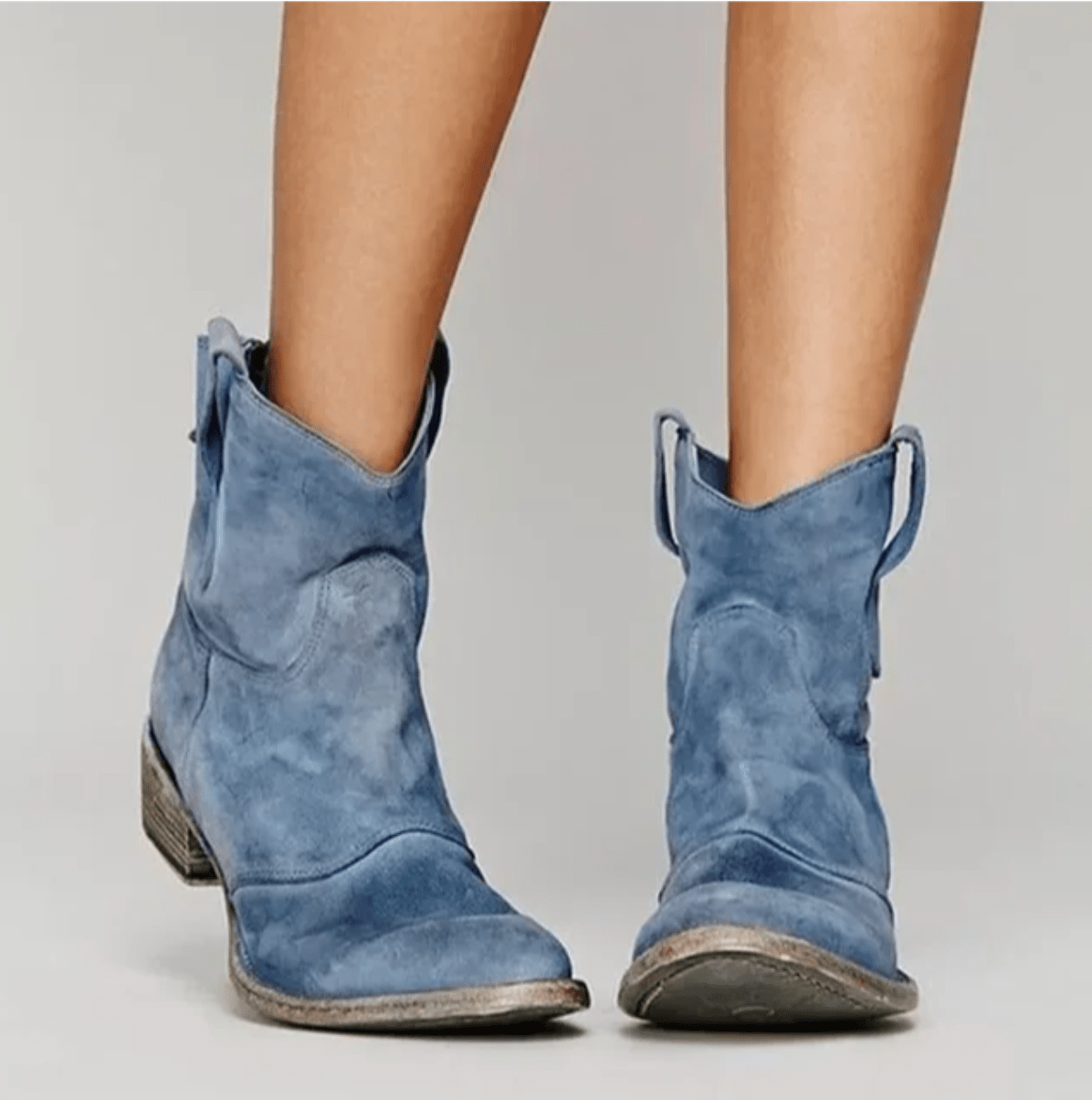 Women's western pull-on ankle boots with curved panel detailing and low block heels