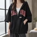 Women's oversized hooded zip-up hoodie with elbow sleeves and letter graphics