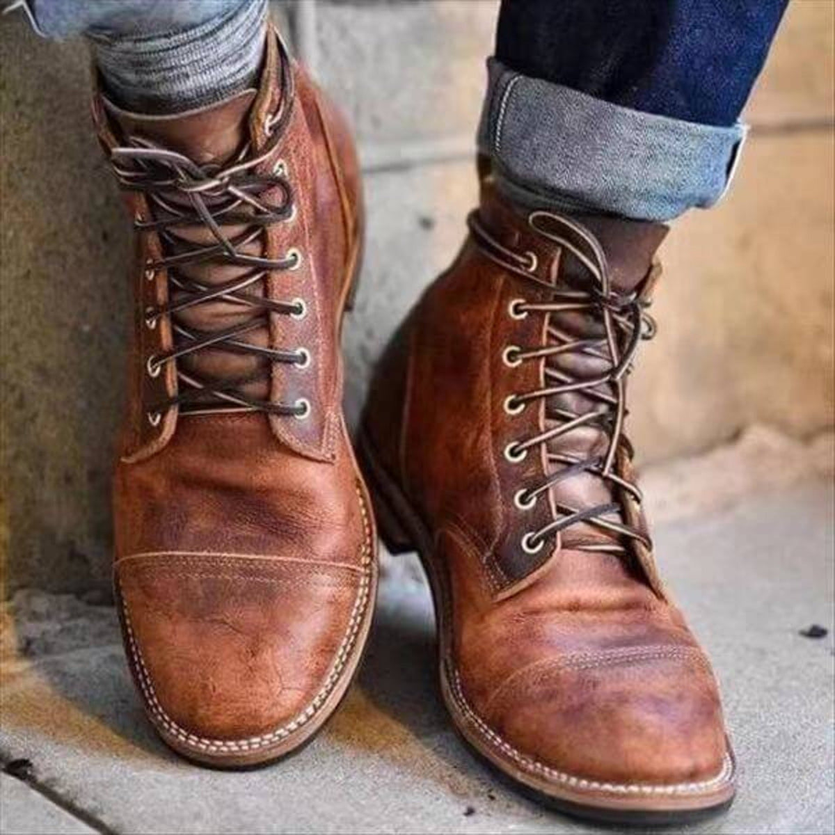 Structured men's lace-up ankle boots with rounded cap toes and low heels